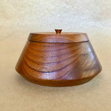 teak timber lidded container, 130mm high 250mm diameter. flared out on base.